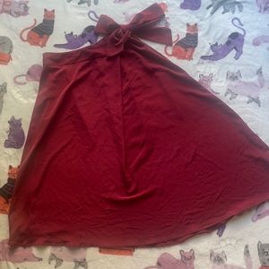 Prologue red skirt, bow on side, L, cinched waistline, no pockets, A-line fit.